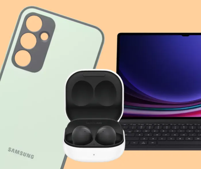 Samsung-Smartphone, Tablet mit Tastatur und kabellose Galaxy Buds vor orangem Hintergrund.