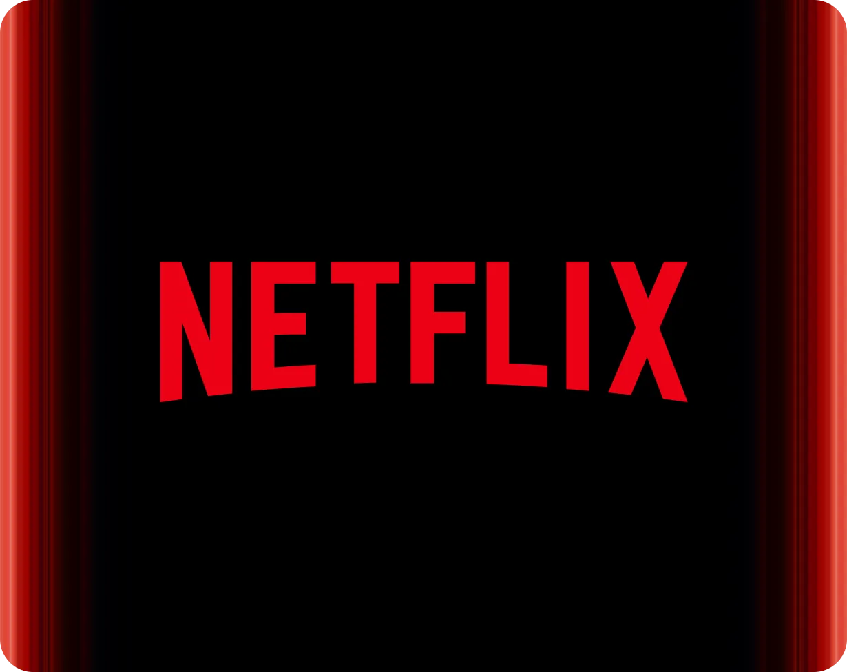 Netflix Logo: rote, leicht gebogene Großbuchstaben auf schwarzem Hintergrund, mit roten Lichtstreifen an den Seiten.