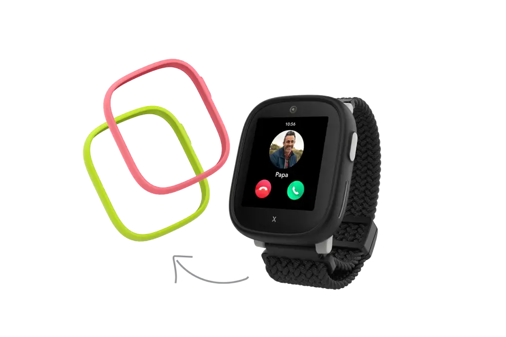 Produktbild einer Kinderuhr XPLORA X6. In schwarz, mit einem Grünen und Pinken Uhrenrahmen.